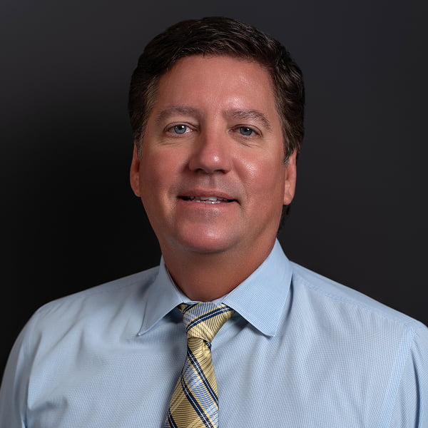 Headshot of Dr. Darryl A. Field in his scrubs